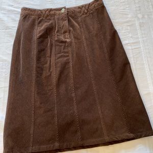 Brown corduroy knee length skirt with front seam detailing. Size small